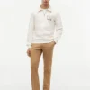 Sudadera polo con logo floral y cremallera de un cuarto
