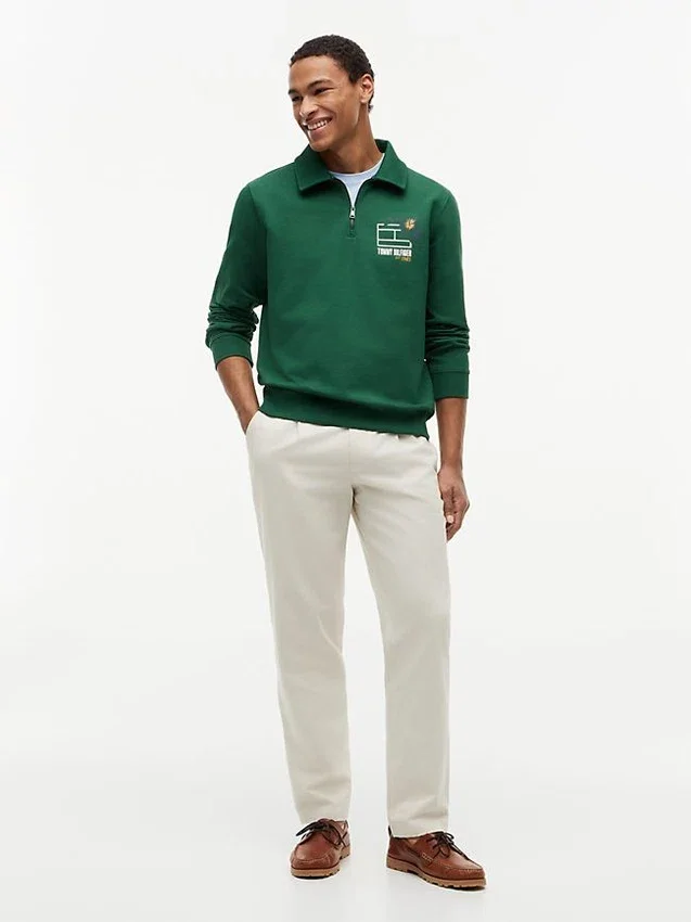 Sudadera polo con logo floral y cremallera de un cuarto Sudadera polo con logo floral y cremallera de un cuarto