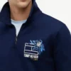 Sudadera polo con logo floral y cremallera de un cuarto