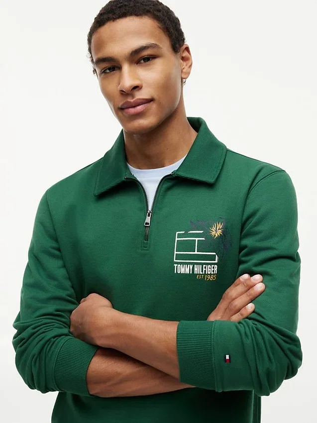 Sudadera polo con logo floral y cremallera de un cuarto Sudadera polo con logo floral y cremallera de un cuarto