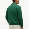 Sudadera polo con logo floral y cremallera de un cuarto Sudadera polo con logo floral y cremallera de un cuarto