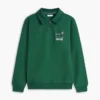 Sudadera polo con logo floral y cremallera de un cuarto Sudadera polo con logo floral y cremallera de un cuarto