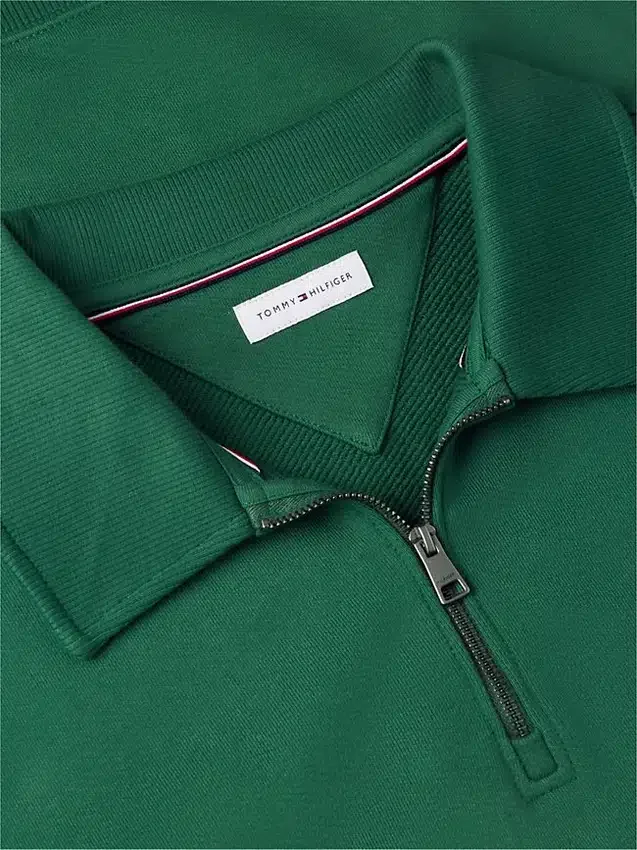 Sudadera polo con logo floral y cremallera de un cuarto Sudadera polo con logo floral y cremallera de un cuarto