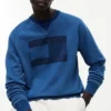 Sudadera raglán teñida en índigo con logotipo de bandera