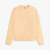 Sudadera teñida en prenda con el logotipo de Tommy Jeans