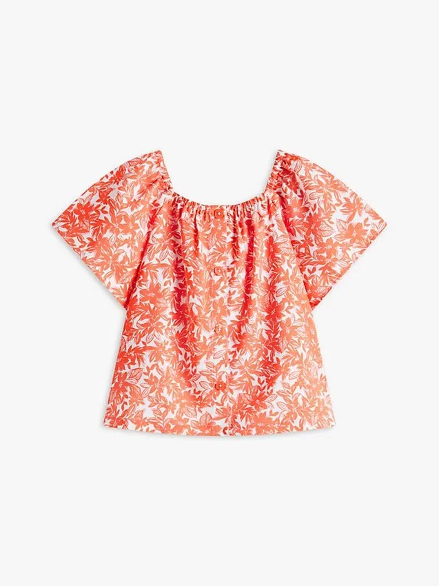 Top infantil con estampado tropical y mangas abullonadas Top infantil con estampado tropical y mangas abullonadas