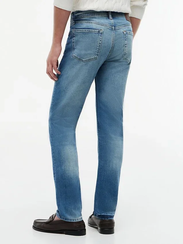 Vaqueros slim elásticos desgastados Vaqueros slim elásticos desgastados