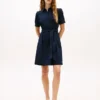 Vestido camisero con cinturón y mangas abullonadas
