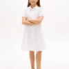 Vestido camisero con ojales bordados para niña