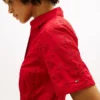 Vestido camisero de popelín con ojales bordados