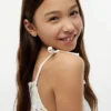 Vestido de niña con estampado de limones y fruncidos Vestido de niña con estampado de limones y fruncidos