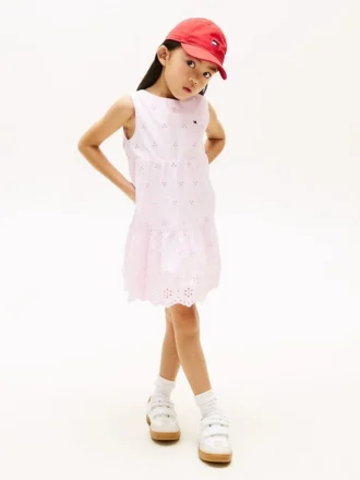 Vestido infantil con lazo y ojales bordados