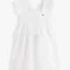 Vestido infantil con volantes y ojales bordados Vestido infantil con volantes y ojales bordados