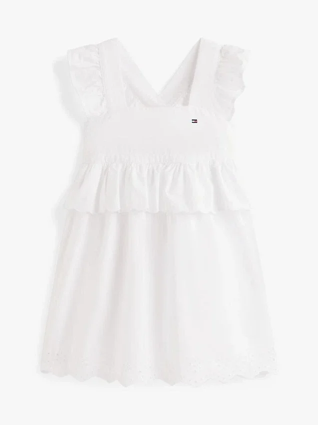 Vestido infantil con volantes y ojales bordados Vestido infantil con volantes y ojales bordados