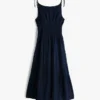 Vestido midi de seersucker con volantes