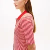 Vestido midi tipo polo con botones dorados
