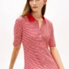Vestido midi tipo polo con botones dorados