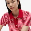 Vestido polo de interlock a rayas con botones dorados