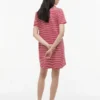 Vestido polo de interlock a rayas con botones dorados