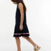 Vestido polo sin mangas con pliegues para niña