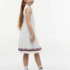 Vestido polo sin mangas con pliegues para niña