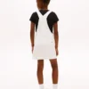 Vestido tipo peto vaquero Hilfiger Denim con insignia para niña Vestido tipo peto vaquero Hilfiger Denim con insignia para niña