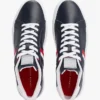 Zapatillas con suela de goma y rayas Zapatillas con suela de goma y rayas