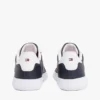Zapatillas con suela de goma y rayas Zapatillas con suela de goma y rayas