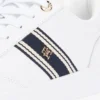 Zapatillas con suela de goma y rayas de cinta Zapatillas con suela de goma y rayas de cinta
