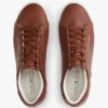 Zapatillas de cancha con textura granulada y logotipo metálico Zapatillas de cancha con textura granulada y logotipo metálico