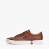 Zapatillas de cancha con textura granulada y logotipo metálico Zapatillas de cancha con textura granulada y logotipo metálico