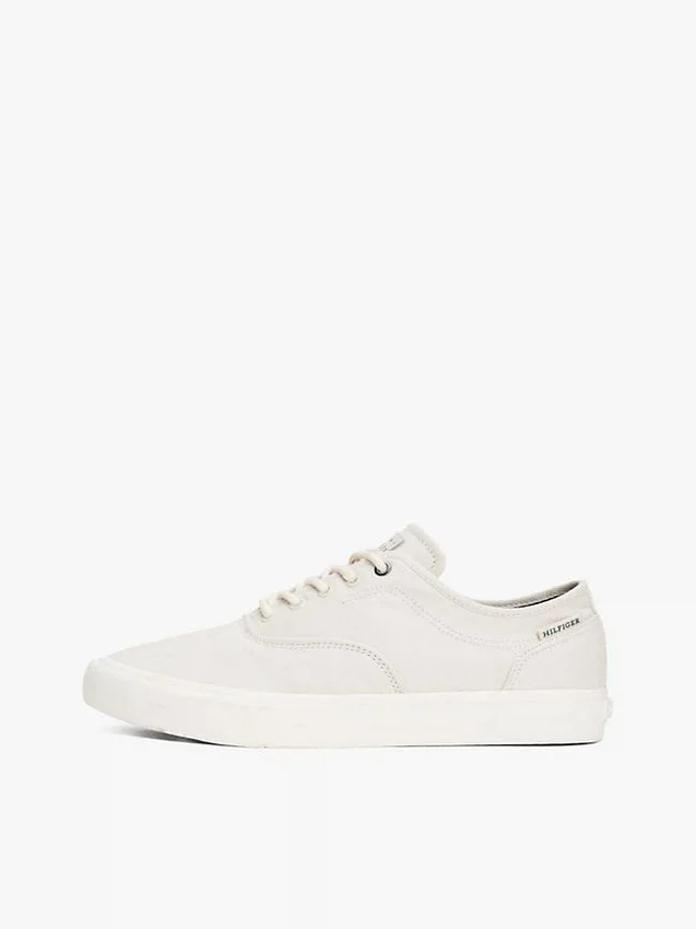 Zapatillas de lona con logotipo en relieve Zapatillas de lona con logotipo en relieve
