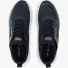 Zapatillas deportivas de estilo runner con materiales mixtos