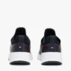 Zapatillas deportivas de estilo runner con materiales mixtos